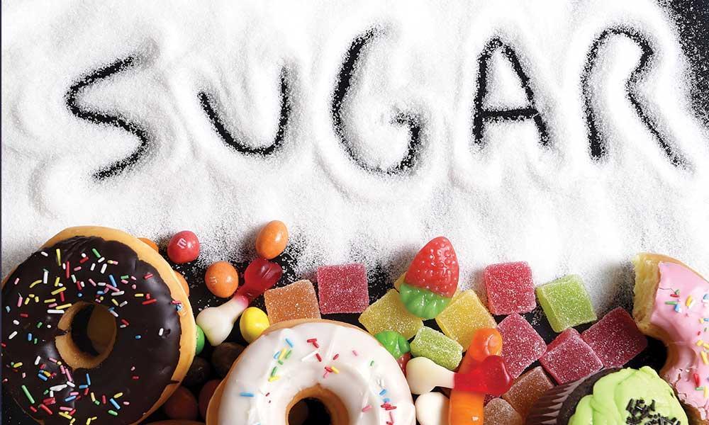 Assorted sugary treats, highlighting the importance of reducing sugar intake for improved health and wellness